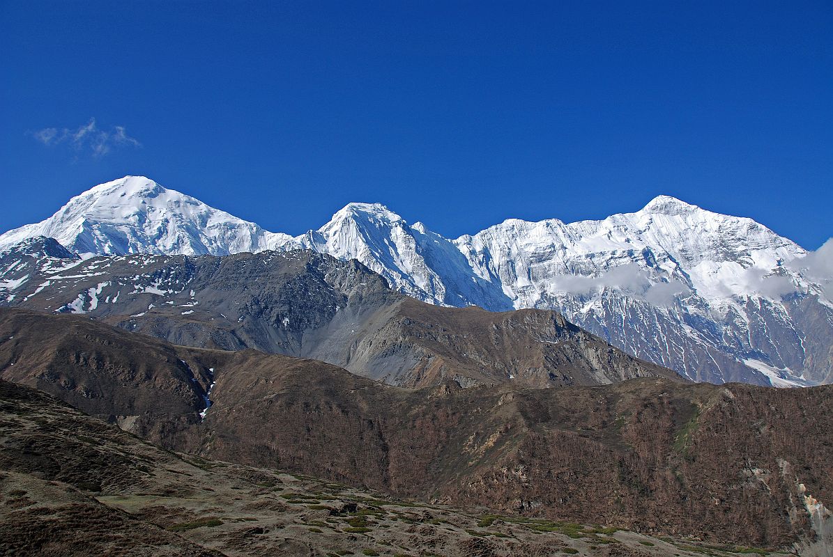 09 Tilicho Peak amd Nilgiri North From Trail To Mesokanto La Tilicho Peak and the wide Nilgiri North ridge was directly across the valley in the early morning from the trail towards the Mesokanto La and Tilicho Lake.